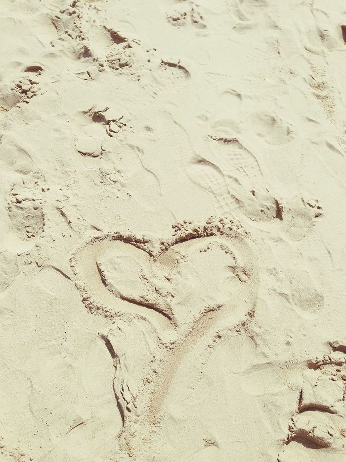 Heart drawn on sand