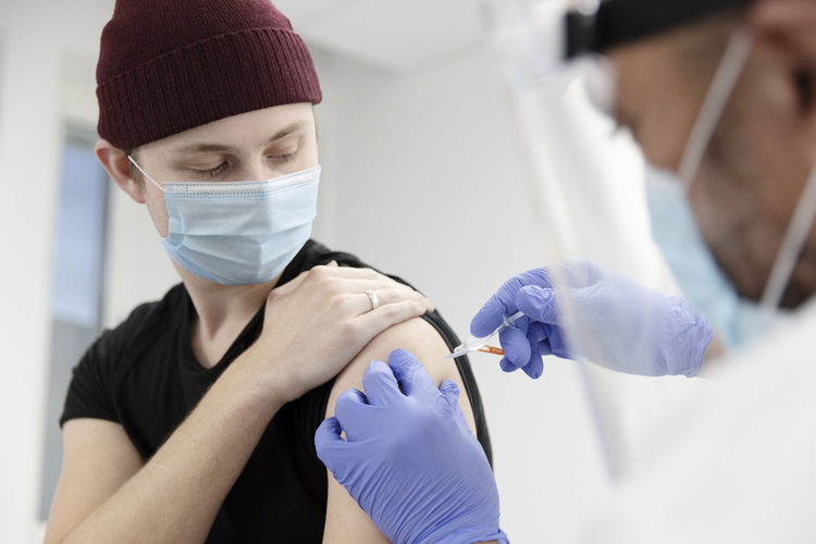 Young man getting vaccinated