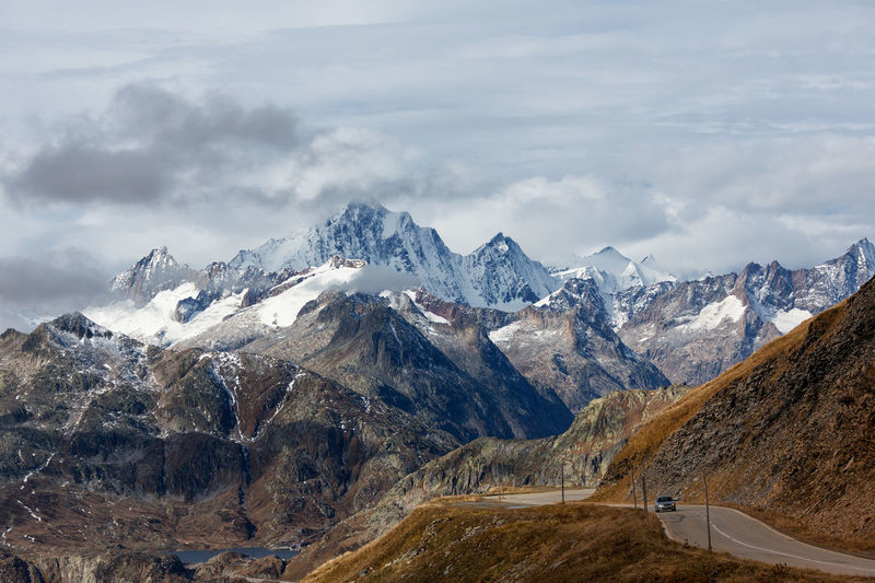 Scenic view of snowcapped mountains against sky
