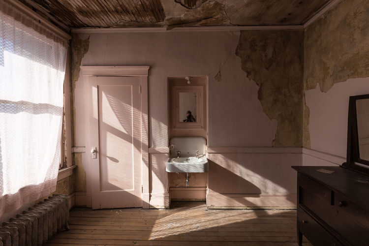 Abandoned interior with closed door