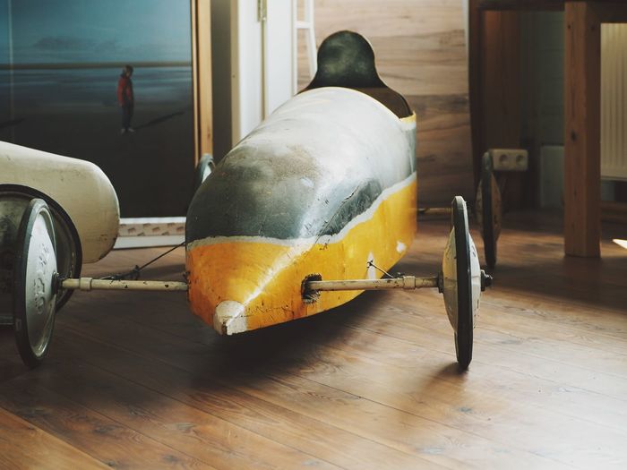 Close-up of bus on hardwood floor