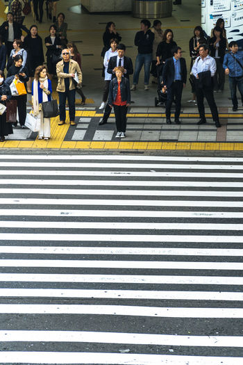 Group of people crossing street