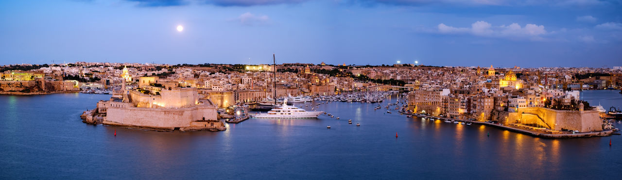 Fort st. angelo on a peninsula with grand harbour views  historical displays at blue hours in malta