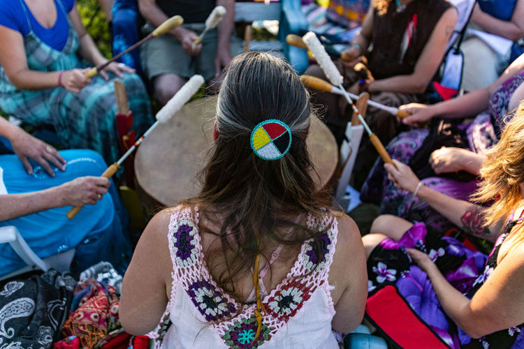 High angle view of people sitting at music festival