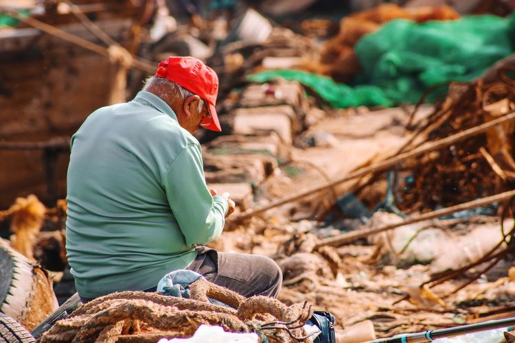 Man working on rock
