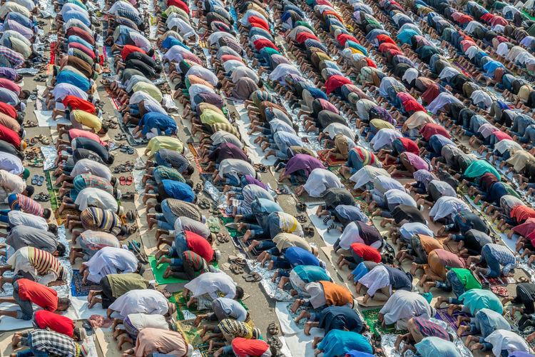 Full frame shot of people praying outdoors