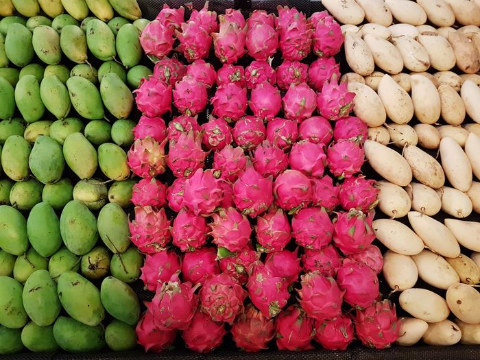 Full frame shot of different colorful fruits in rows  for sale in market