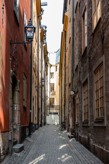 Narrow alley amidst residential buildings