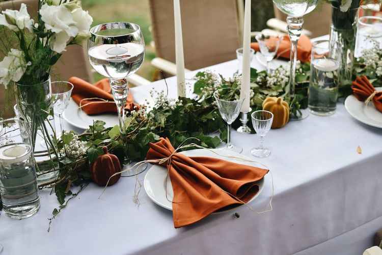 View of  table setting with orange decoration