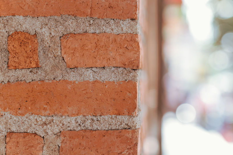 Texture of brick wall with beautiful bokeh, shallow depth of field